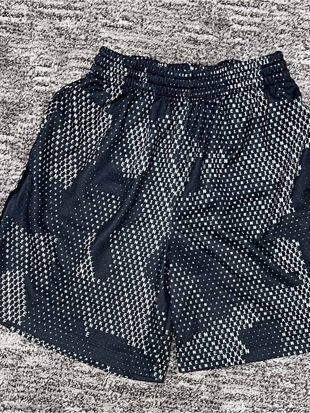 Nike Black Athletic Shorts with White Logo Print